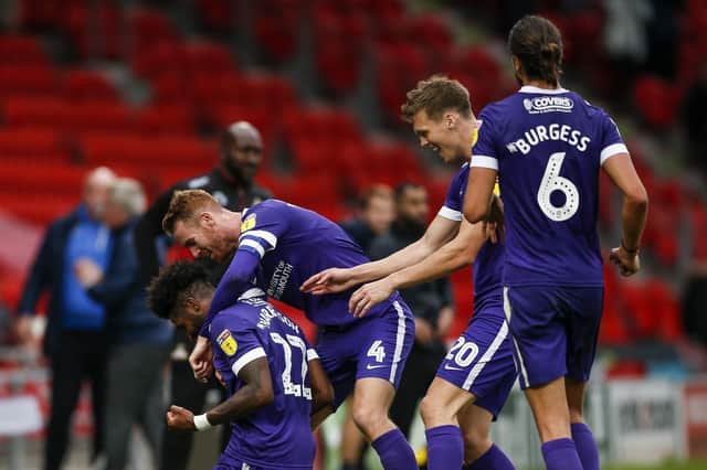 Ellis Harrison celebrates his last-gasp winner for Pompey at Doncaster. Picture: Daniel Chesterton/PinPep