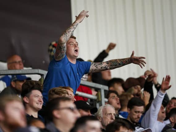 Pompey fans at the Keepmoat Stadium. Picture: Daniel Chesterton/PinPep