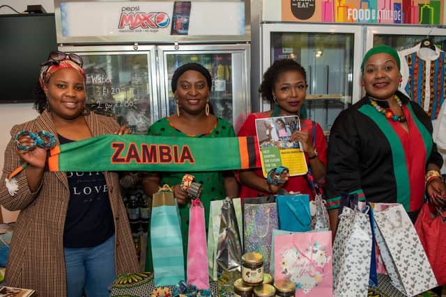 Towera Zimuto, Priscilla Muyatwa, Ummi Akinpelu and Carol Hazikyriako with their handmade bangles and honey at a stall supporting the Noah Mapalo Help Centre, at the African-Caribbean Fusion Festival at the University of Portsmouth's Eldon building Picture: Vernon Nash (051019-007)