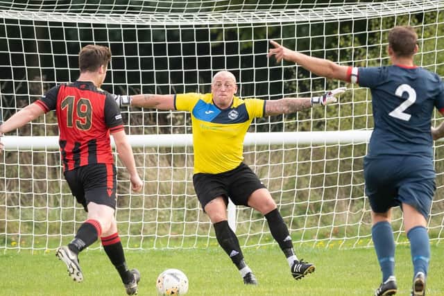 Jake Pepall about to score Fleetlands' second goal against Paulsgrove