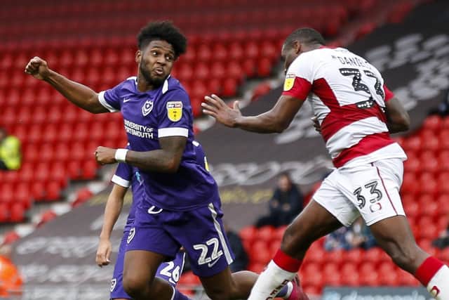 Ellis Harrison heads home Pompey's winner at Doncaster. Picture: Daniel Chesterton/PinPep