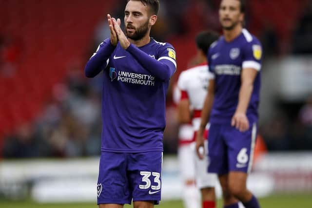 Ben Close toasts Pompey's victory. Picture: Daniel Chesterton/PinPep
