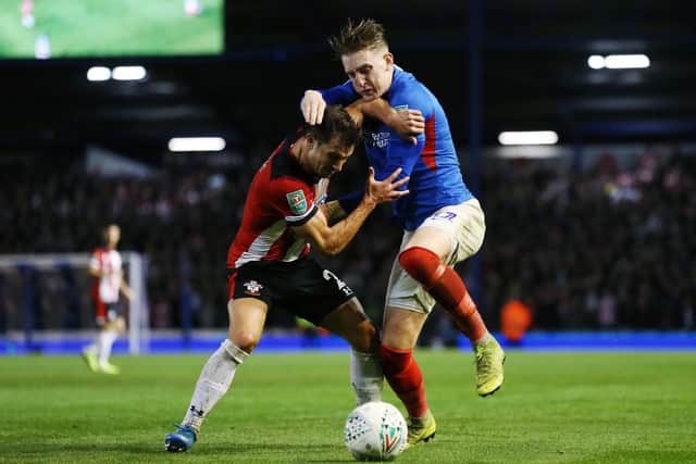 Ronan Curtis battles for possession against Southampton. Picture: Joe Pepler/PinPep
