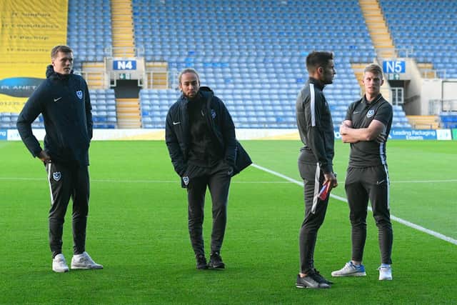 Pompey check out the playing surface prior to kick-off
