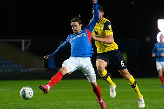 Ryan Williams tries to take the ball is his stride