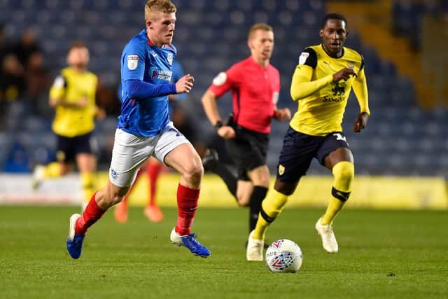Andy Cannon (14) of Portsmouth on the attack during the Leasing.com EFL Trophy match between Oxford United and Portsmouth at the Kassam Stadium, Oxford, England on 8 October 2019.