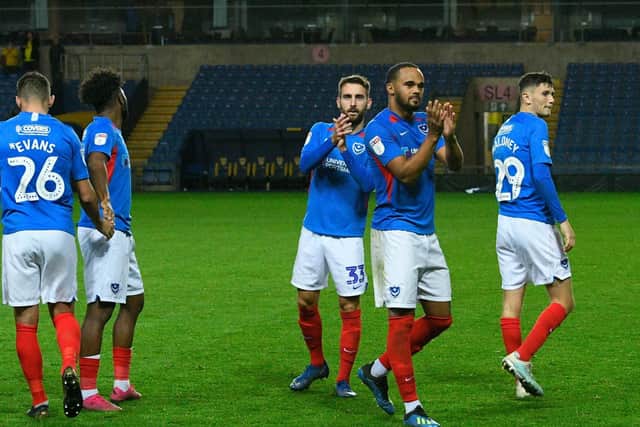 Portsmouth players including Ellis Harrison and Ben Close applauds the fans after the the team won the penalty shoot out at full time during the Leasing.com EFL Trophy match between Oxford United and Portsmouth at the Kassam Stadium, Oxford, England on 8 October 2019.