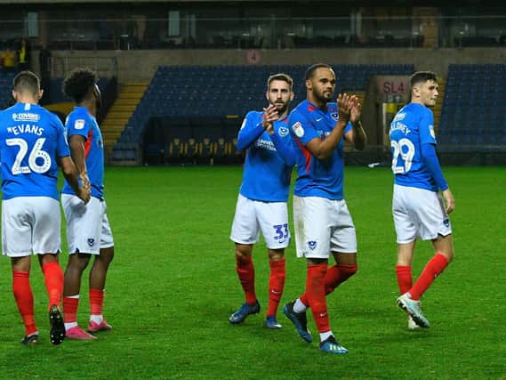 Portsmouth players including Ellis Harrison and Ben Close applauds the fans after the the team won the penalty shoot out at full time during the Leasing.com EFL Trophy match between Oxford United and Portsmouth at the Kassam Stadium, Oxford, England on 8 October 2019.
