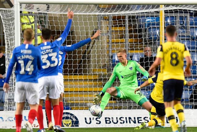 Alex Bass pulls off yet another superb stop during a man-of-the-match performances in last night's Leasing.com Trophy fixture at Oxford United. Picture: Graham Hunt/ProSportsImages