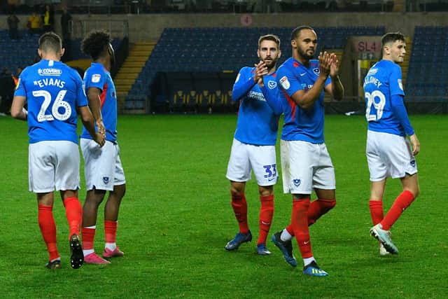 Pompey's players applaud the fans following their 5-4 penalty shoot-out success over Oxford United. Picture: Graham Hunt/ProSportsImages