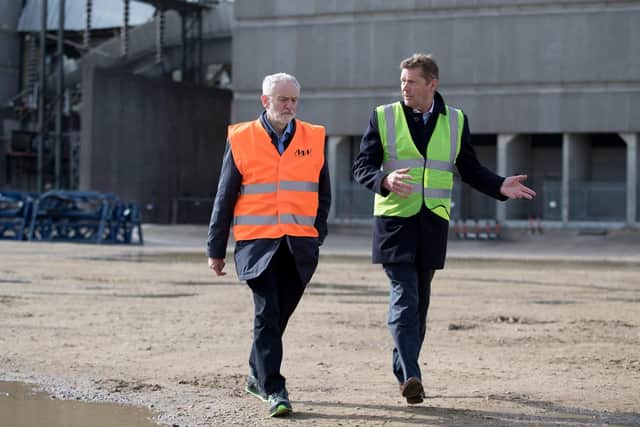 Labour Party leader Jeremy Corbyn (left) speaks to Julian Brown, UK Country Manager for MHI Vestas Offshore, during a visit to the decommissioned Fawley Power Station in Hampshire. Picture: Andrew Matthews/PA Wire