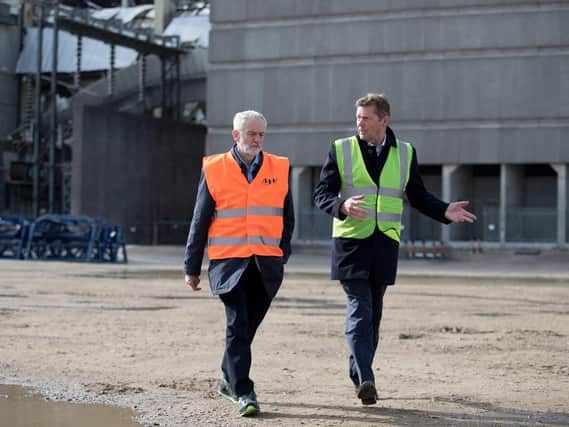 Labour Party leader Jeremy Corbyn (left) speaks to Julian Brown, UK Country Manager for MHI Vestas Offshore, during a visit to the decommissioned Fawley Power Station in Hampshire. Picture: Andrew Matthews/PA Wire