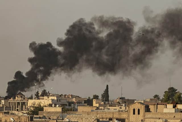 Smoke billows following Turkish bombardment on Syria's northeastern town of Ras al-Ain in the Hasakeh province along the Turkish border on October 9, 2019. Photo: Delil Souleiman/AFP via Getty Images