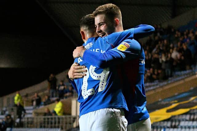 Gosport's Bradley Lethbridge celebrates scoring Pompey's leveller at Oxford United with former Academy team-mate Leon Maloney, who hails from the Isle of Wight. Picture: Graham Hunt/ProSportsImages