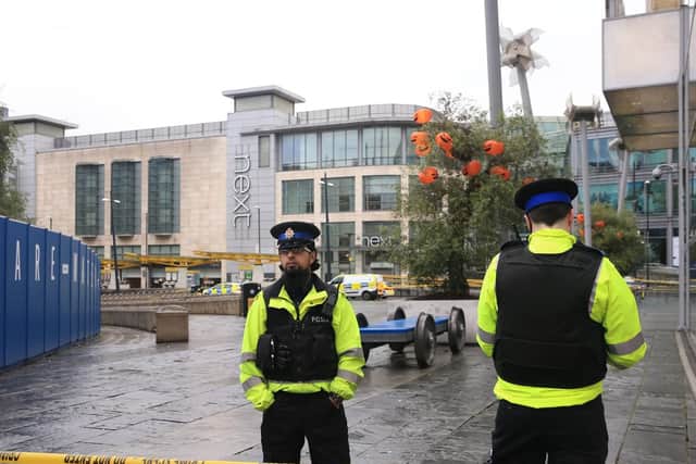 Police outside the Arndale Centre in Manchester where at least four people have been treated after a stabbing incident. Picture: Peter Byrne/PA Wire
