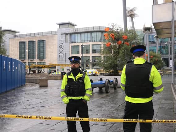 Police outside the Arndale Centre in Manchester where at least four people have been treated after a stabbing incident. Picture: Peter Byrne/PA Wire