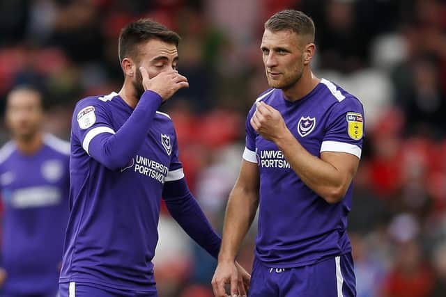 Lee Brown and Ben Close stand over a set-piece at Doncaster