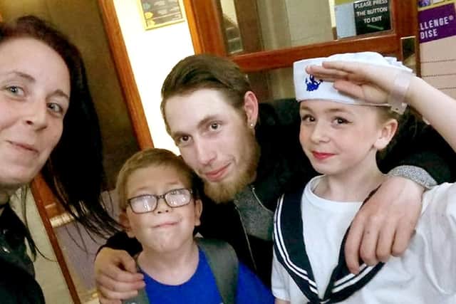 Leo Burton with his mum, dad and sister Courtney. Picture: Supplied