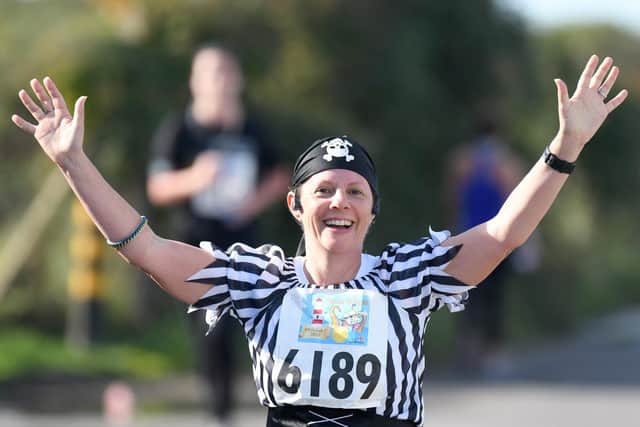 The RNLI 10k and Pieces of Eight races always provide a great occasion on Southsea seafront. Action from the 2018 edition of the eight-mile race. Picture: Neil Marshall