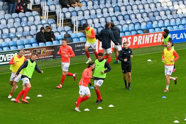 Portsmouth players warming up ahead of the match