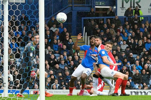 Sean Raggett's first-half header hits the post in Saturday's goalless draw against Gillingham. Picture: Graham Hunt/ProSportsImages