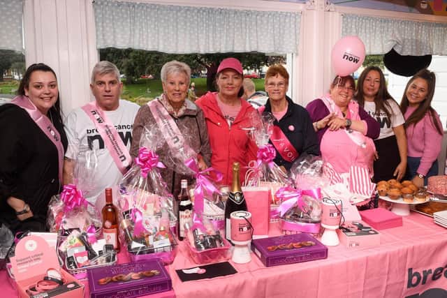 Some of the participants in the walk with the raffle prizes. Sharon Forder is in the centre with the cap.
Picture: Keith Woodland (131019-11)