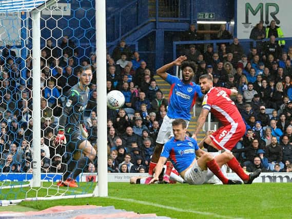 Sean Raggett headed against the post in Pompey's draw with Gillingham. Picture: Graham Hunt