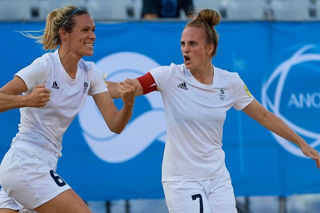 Wendy Martin, left, and Sarah Kempson celebrate a goal as GB hit back from 2-5 down to reach the World Beach Games Beach Soccer final