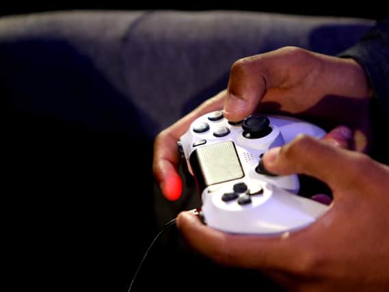 Fancy being paid to tutor kids to play video games? (Photo by Alex Pantling/Getty Images)