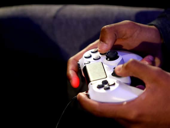 Fancy being paid to tutor kids to play video games? (Photo by Alex Pantling/Getty Images)
