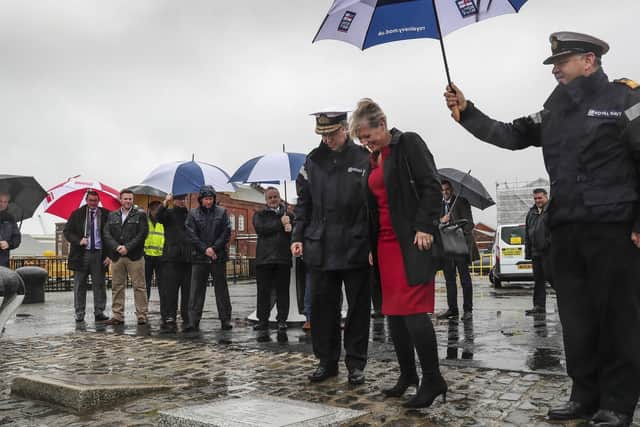 RAdm Martin Connell, Mrs Penny Connell and Cdre JJ Bailey at the opening of the new Victory Jetty. Picture: Belinda Alker/MoD