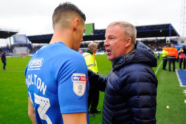 Pompey boss Kenny Jackett with James Bolton ahead of last Saturday's Gillingham game