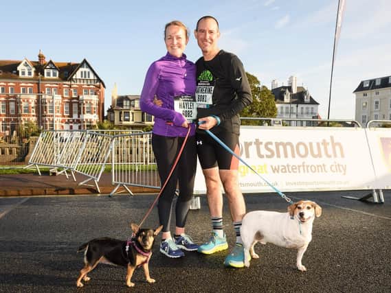 Hayley Newell with Min the dog and Cristian Lopez with Smudge the three legged Jack Russell.

Picture: Keith Woodland