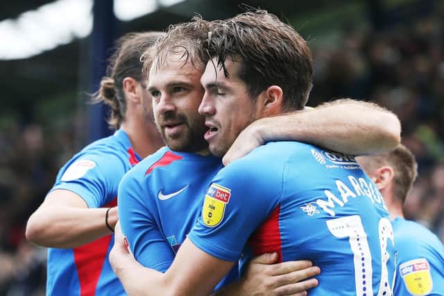 Brett Pitman, left, with John Marquis
