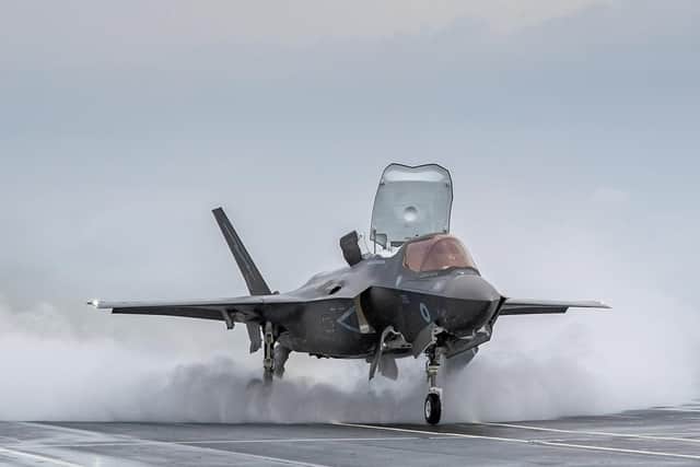 A UK F-35 lands on the deck of HMS Queen Elizabeth. Photo: Royal Navy