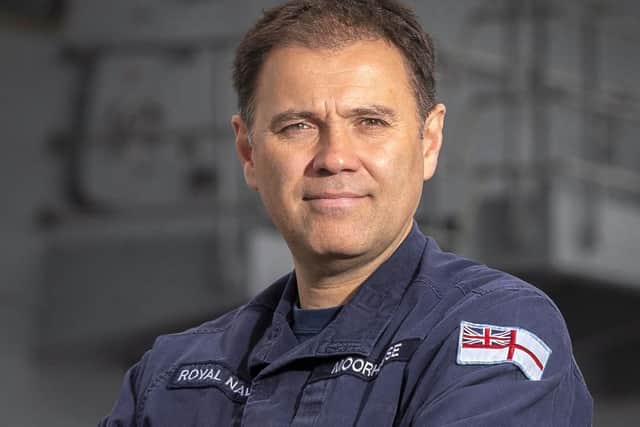 Pictured is Captain Steve Moorhouse, commanding officer of HMS Queen Elizabeth. Here he is pictured on the deck of Queen Elizabeth during her latest test mission in the USA. Photo: Royal Navy