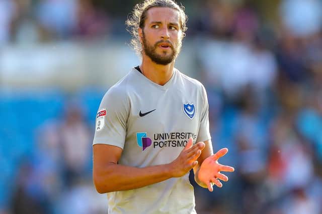 Portsmouth defender Christian Burgess (6) thanks the travelling fans during the EFL Sky Bet League 1 match between Wycombe Wanderers and Portsmouth at Adams Park, High Wycombe, England on 21 September 2019.