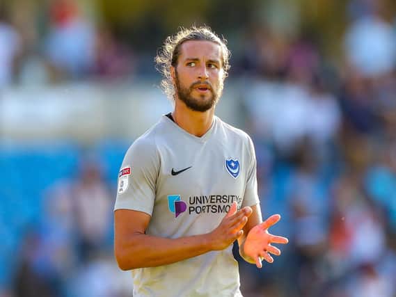 Portsmouth defender Christian Burgess (6) thanks the travelling fans during the EFL Sky Bet League 1 match between Wycombe Wanderers and Portsmouth at Adams Park, High Wycombe, England on 21 September 2019.