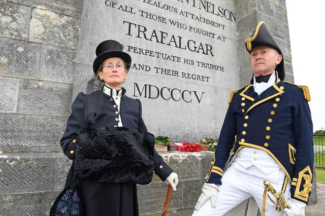 Janet Mummery and Roger Glancefield from 'The Nelson Society' at the Nelson Monument
Picture: Malcolm Wells (191021-8761)