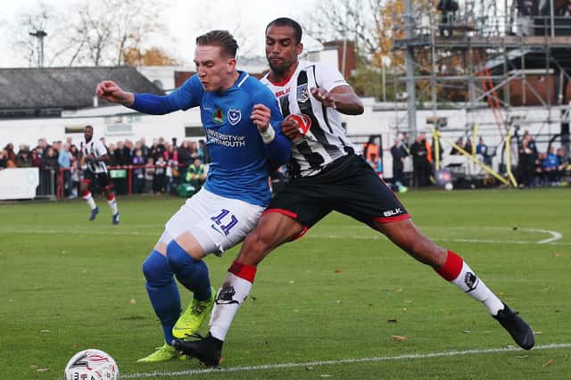 Ronan Curtis battle for the ball in Pompey's FA Cup first round tie at Maidenhead United last season