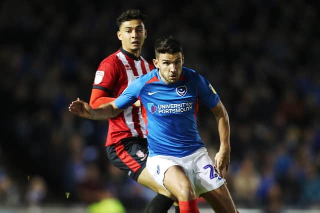 Gareth Evans looks for a pass