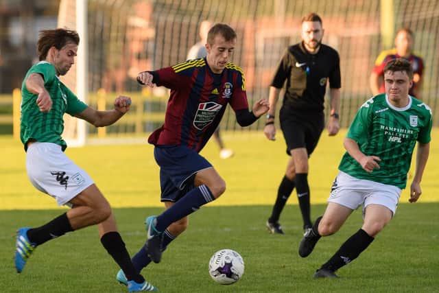 James Franklyn struck a superb hat-trick as US Portsmouth stormed to the top of the Wessex Division 1 table