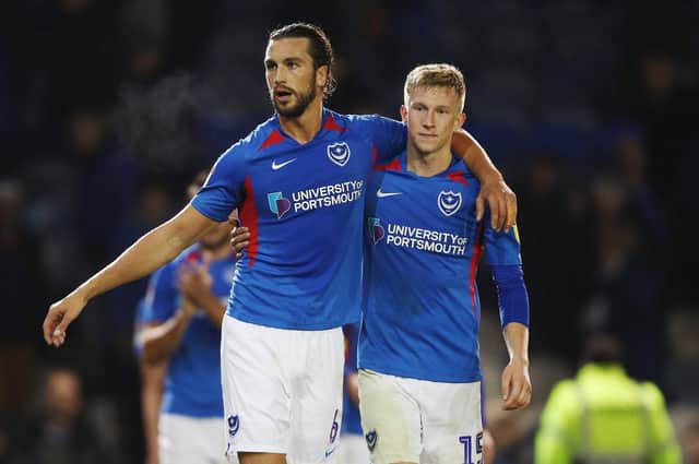 Christian Burgess and Ross McCrorie look pleased after Pompey's win against Lincoln