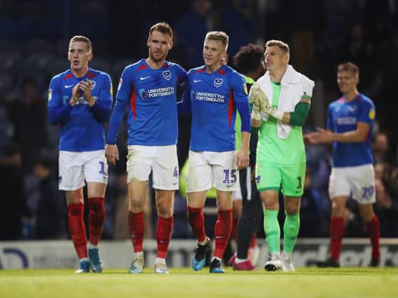 Ross McCrorie, right, celebrates Pompey's win with Tom Naylor. Picture: Joe Pepler