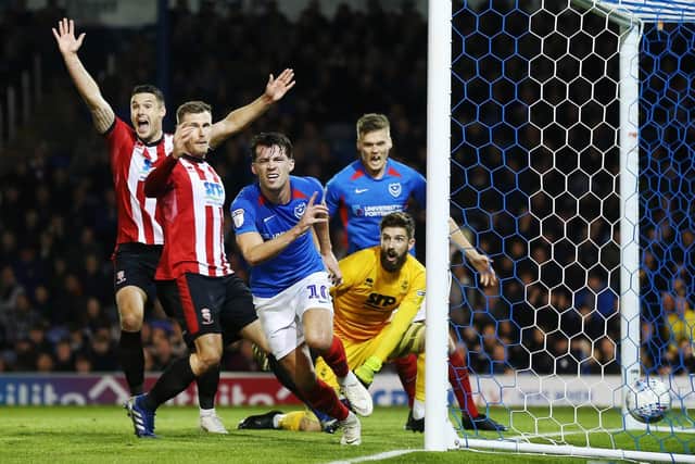 John Marquis wheels away after netting the winner against Lincoln