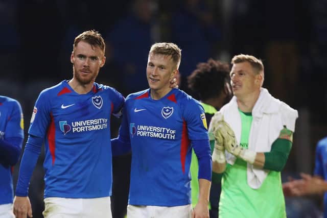 Tom Naylor and Ross McCrorie look relieved after the final whistle against Lincoln