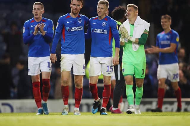 Gaffer for a Day, Steve Ayling, thought Tom Naylor (centre) was Pompey's man of the match against Lincoln. Picture: Joe Pepler