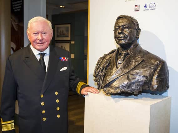 Sir Donald Gosling stands beside a bust of himself which was unveiled by HRH the Princess Roya at the National Museum of the Royal Navy in Portsmouth in June, 2014. Photo: Christopher Ison/NMRN