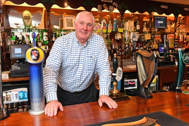 Martin McGuire, behind the bar at Portsmouth Irish Club. Picture: Malcolm Wells.