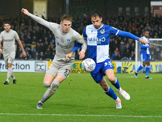 Ronan Curtis battles for possession with Alex Rodman. Picture: Graham Hunt